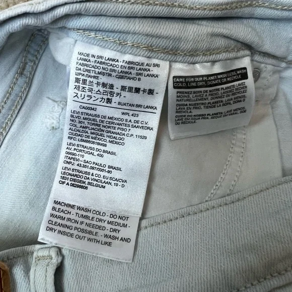 Light Blue Levi's High Waist White Denim Shorts - Picture 5 of 5